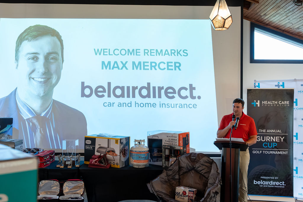 Welcome remarks screen with sponsor branding at the 2026 Gurney Cup Golf Tournament