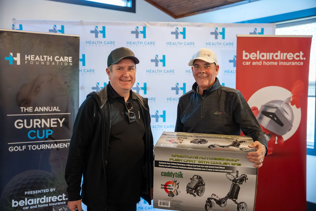 Golfers receiving a prize at the 2026 Gurney Cup Golf Tournament