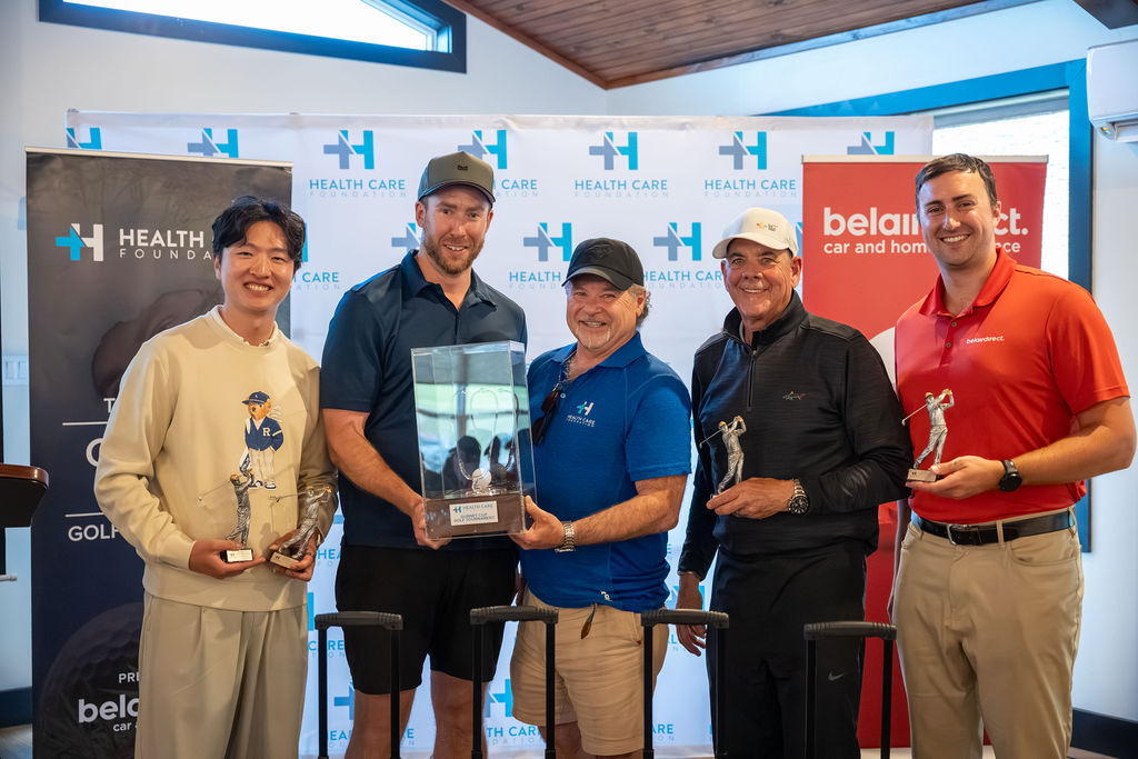 Winning team holding the trophy at the 2026 Gurney Cup Golf Tournament