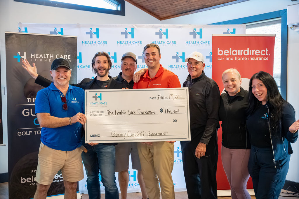 Team accepting a cheque at the 2026 Gurney Cup Golf Tournament