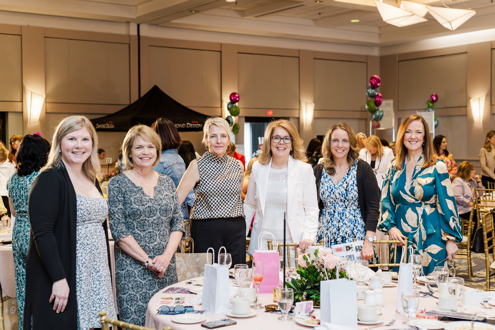 Guests gathered in a ballroom at Brunch with the Bags