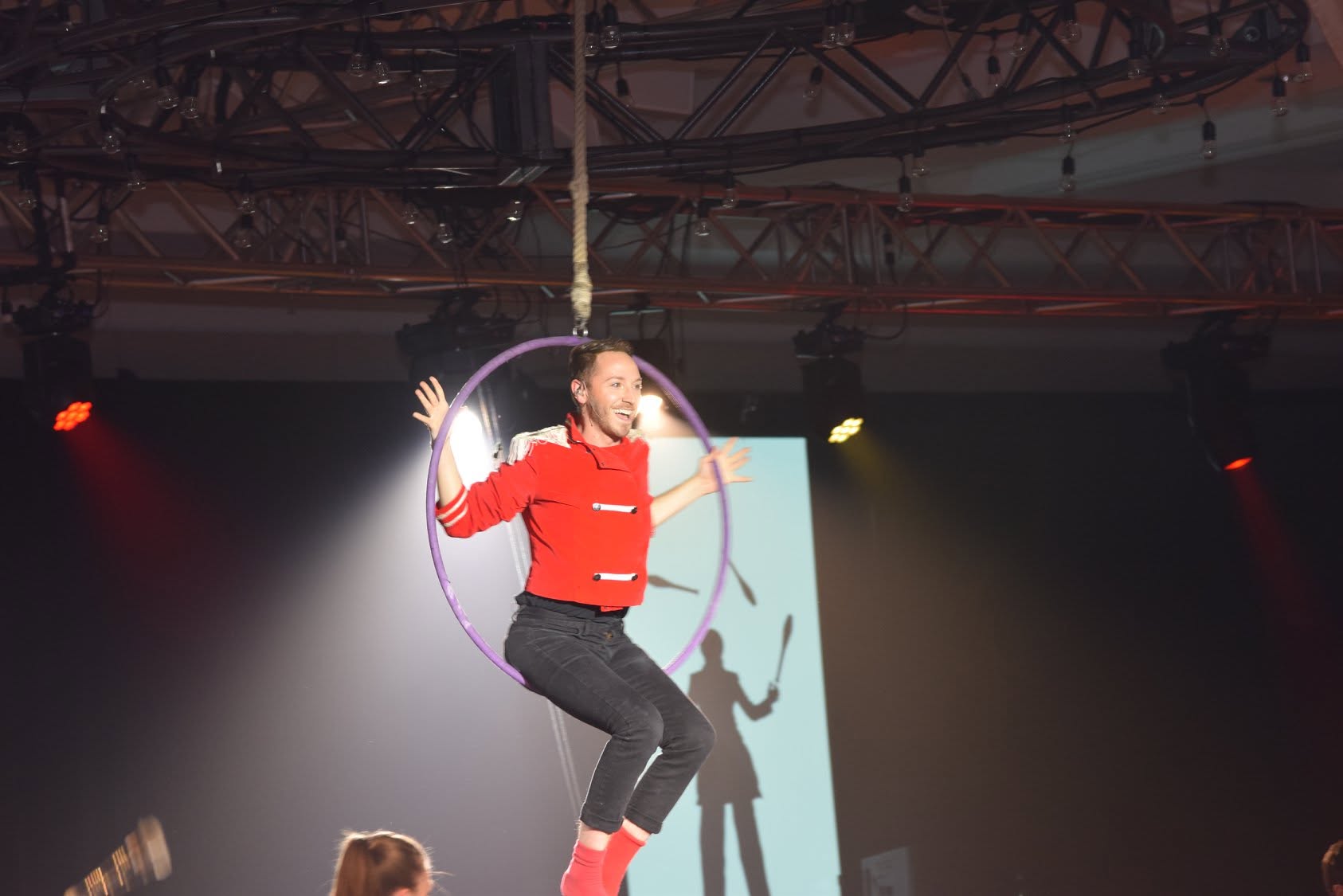 Aerial hoop performer at a Health Care Foundation gala