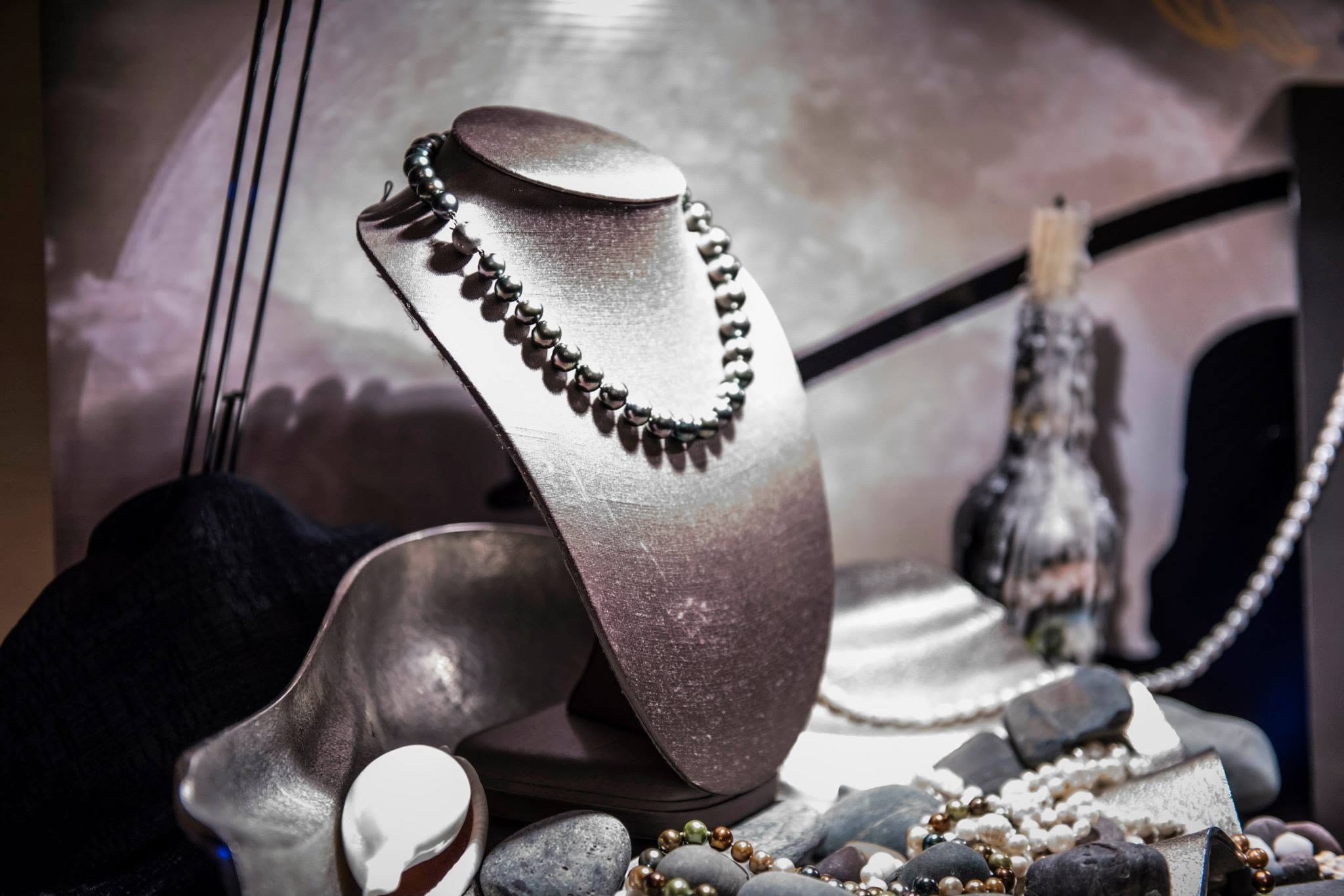 Jewellery displayed on a stand at a gala silent auction