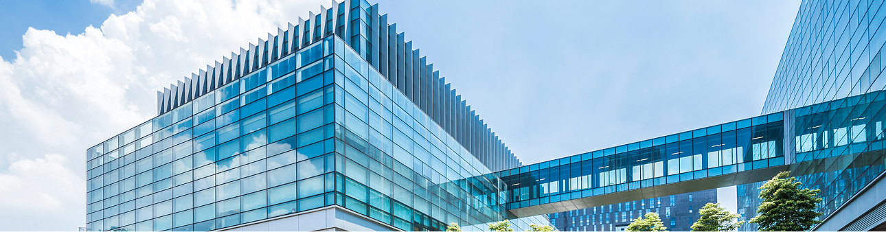 Exterior of a modern glass hospital building