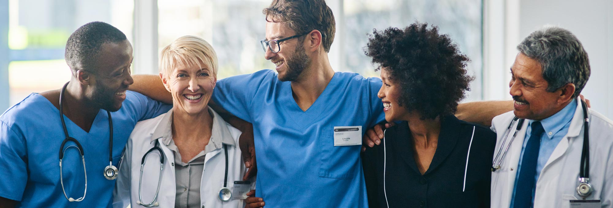 Diverse health care team standing together