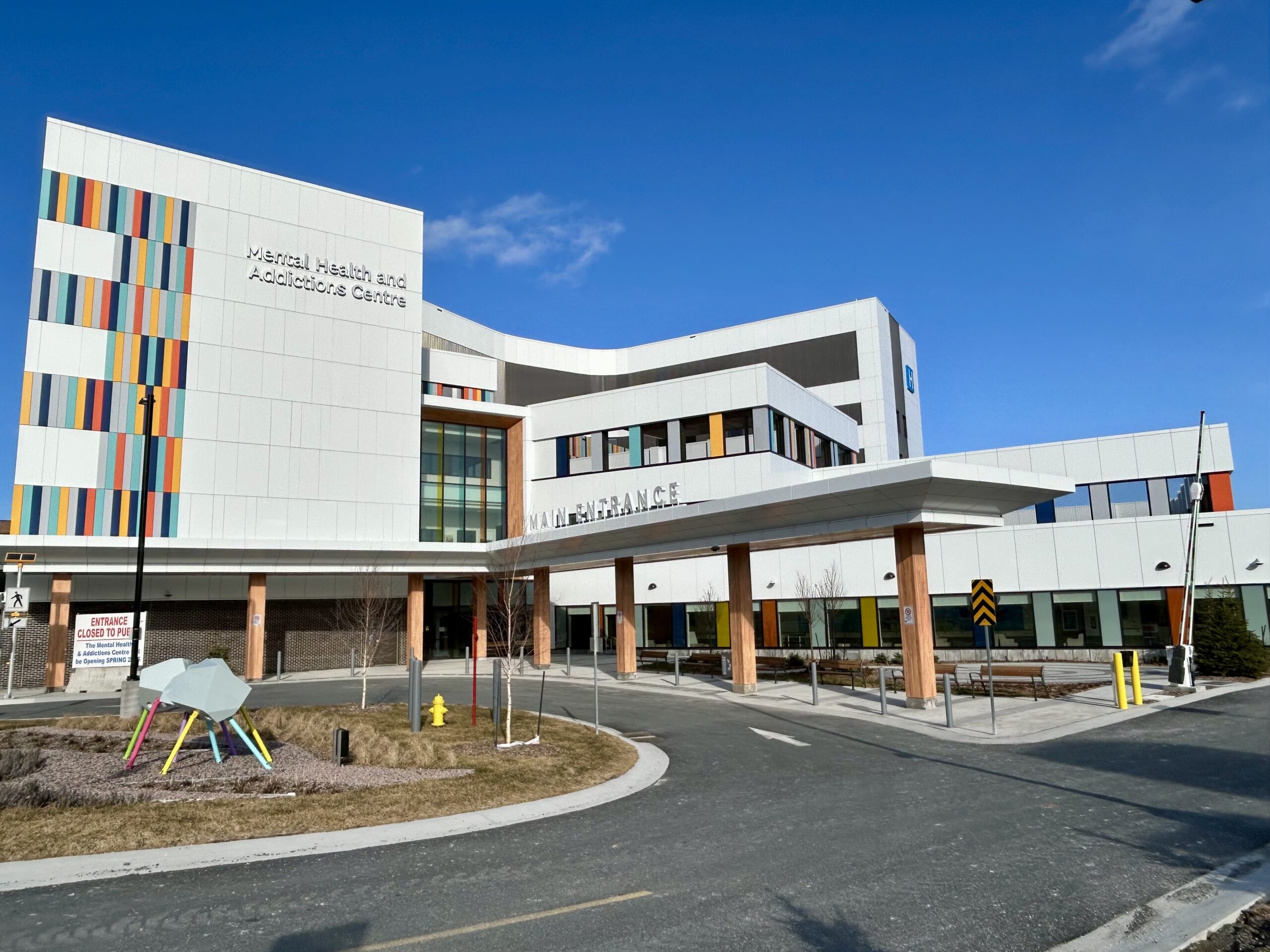 Patient and visitor drop-off zone outside a modern health centre