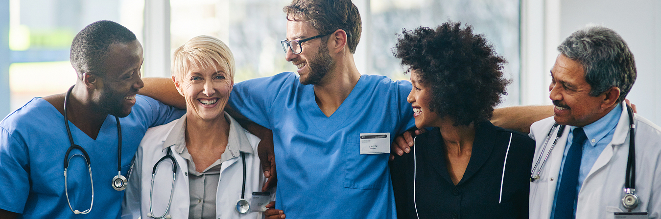 Diverse health care team standing together